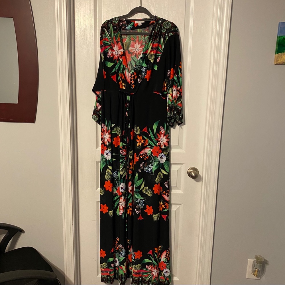 Black maxi dress with a tropical print